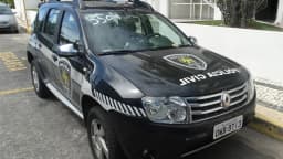 Viatura da Polícia Civil do Rio Grande do Norte estacionada em via pública