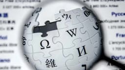 Logo da Wikipédia, o globo-quebra-cabeça com caracteres de diferentes idiomas