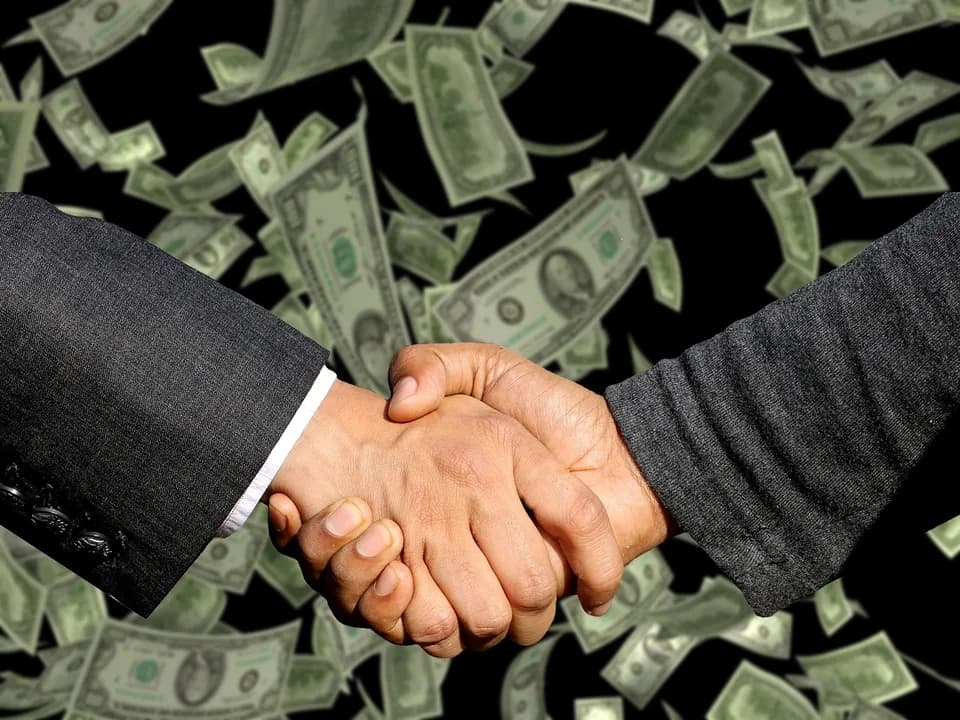 Imagem ilustrativa: handshake, agreement, trade, business, profit, sale, commercial, money, contract, concept, gesture, handshake, trade, money, money, money, money, money