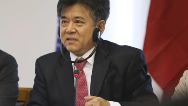 Oficial chinês fala durante encontro sobre comércio entre China e Brasil