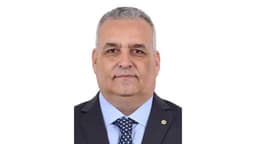 Retrato oficial do deputado federal Alfredo Gaspar, de terno escuro e gravata, escolhido vice de Flávio Bolsonaro