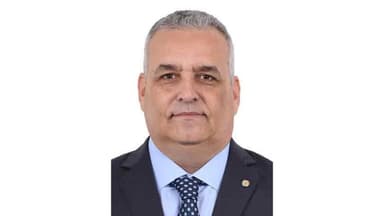 Retrato oficial do deputado federal Alfredo Gaspar, de terno escuro e gravata, escolhido vice de Flávio Bolsonaro