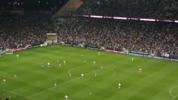 Jogadores em campo durante partida do Campeonato Brasileiro na Arena Corinthians