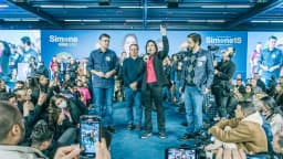 Simone Tebet discursa em evento de campanha em São Paulo, cercada de apoiadores e imprensa (foto de arquivo, 2022)