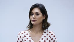 Michelle Bolsonaro sentada durante evento na Câmara dos Deputados, em imagem de arquivo de maio de 2019