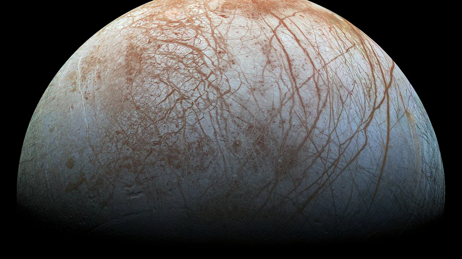 Imagem real da lua Europa, de Júpiter, feita por sonda da Nasa